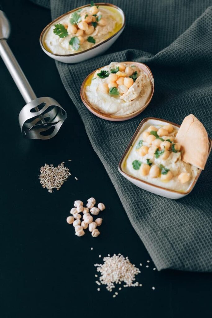 Bread With Sliced Banana and Black Beans on White Ceramic Plate